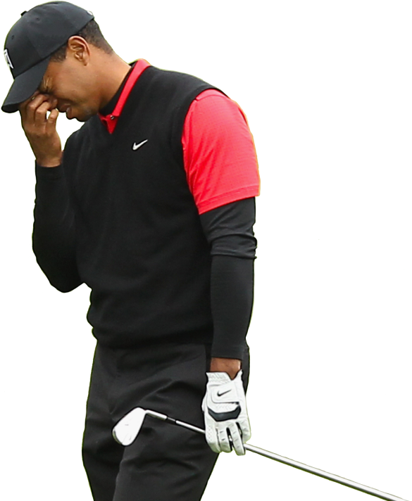 Tiger Woods regretting a bad shot