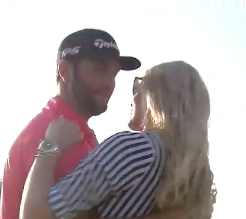 Jon Rahm kisses wife Kelley Cahill after winning 2023 Masters