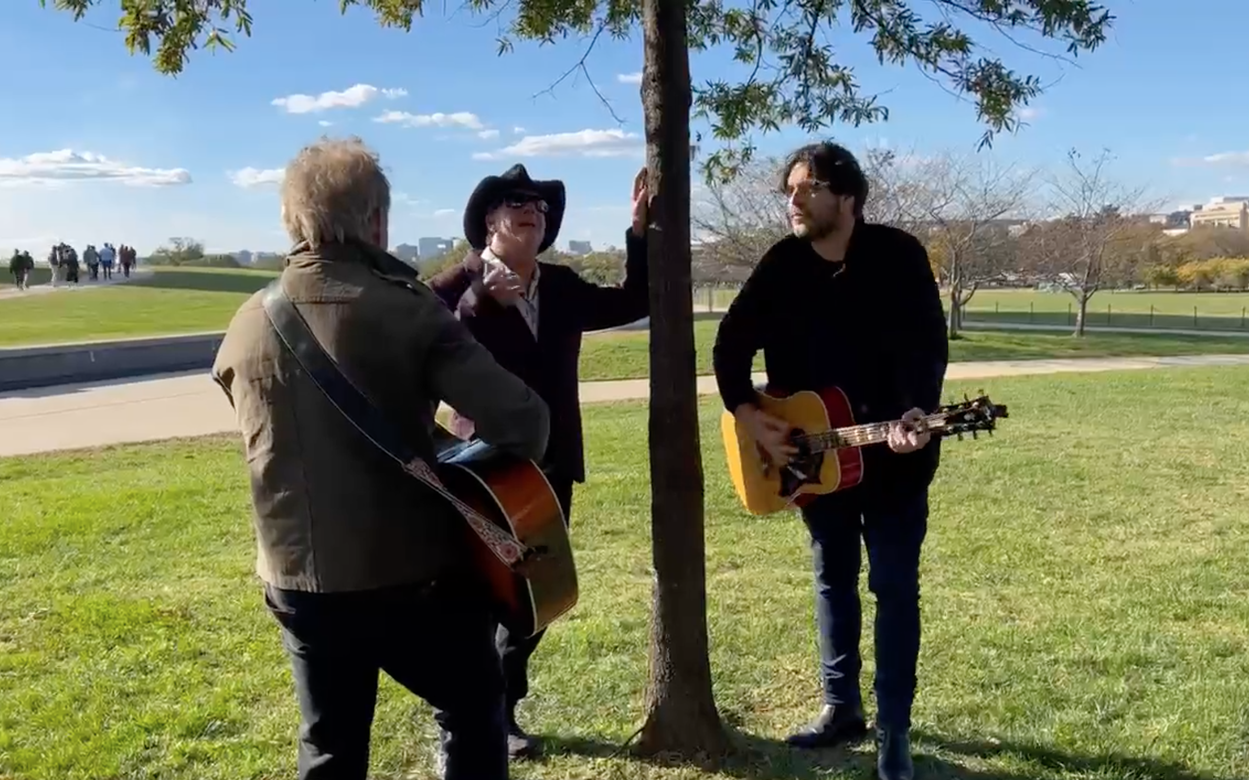 Nothing to see here, just Jim Irsay leaning on a tree, singing